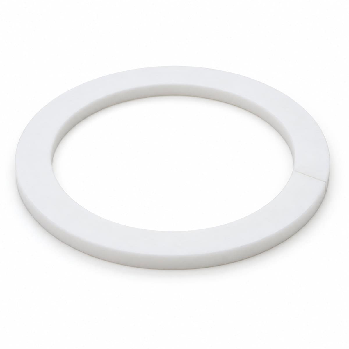 White PTFE split ring for pump maintenance and repair.